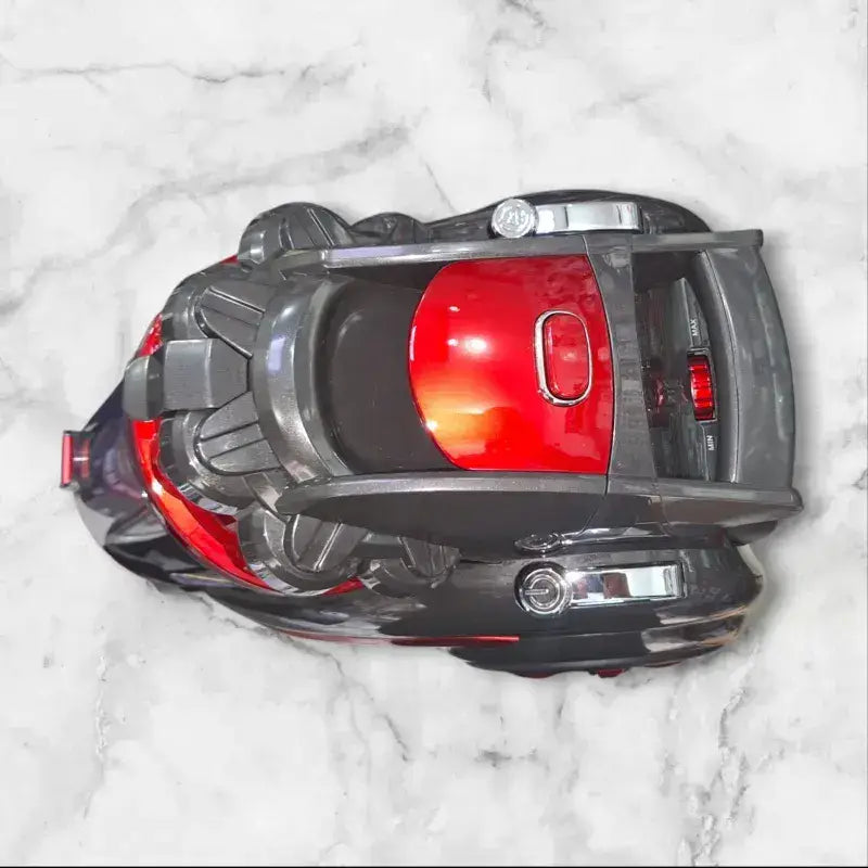 Aspirateur 2200 watt cyclone dyson rouge et noir au design futuriste et élégant pour un nettoyage performant