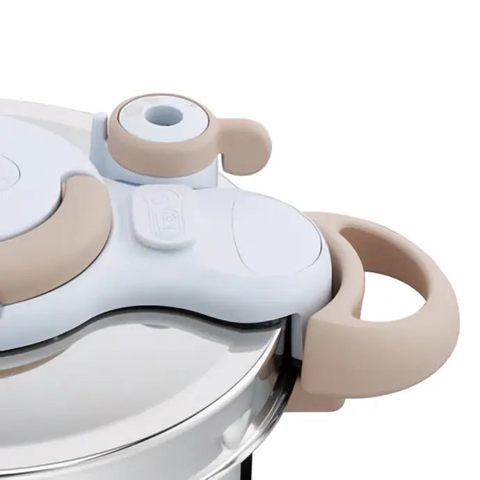 Couvercle blanc et beige de autocuiseur clipso minut eco 7,5 l avec poignées ergonomiques et valve de sécurité
