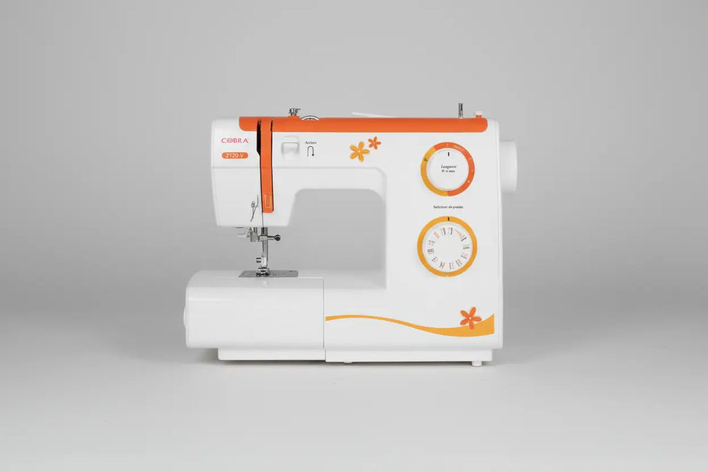 Machine à coudre 2120-v cobra blanche et orange avec motifs floraux pour couture précise et décorative